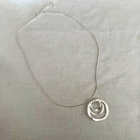 Silvertone Necklace 22-24 inches with Pendant Trio of Irregular Textured Rings - Picture 4 of 6